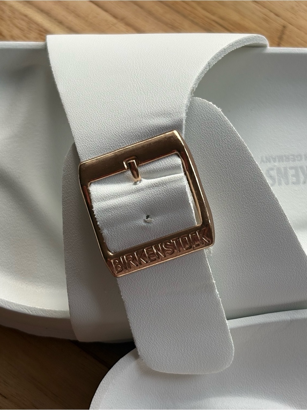 White Birkenstock Madrid Big Buckle EVA sandals with gold-toned buckles. - Picture 3 of 9